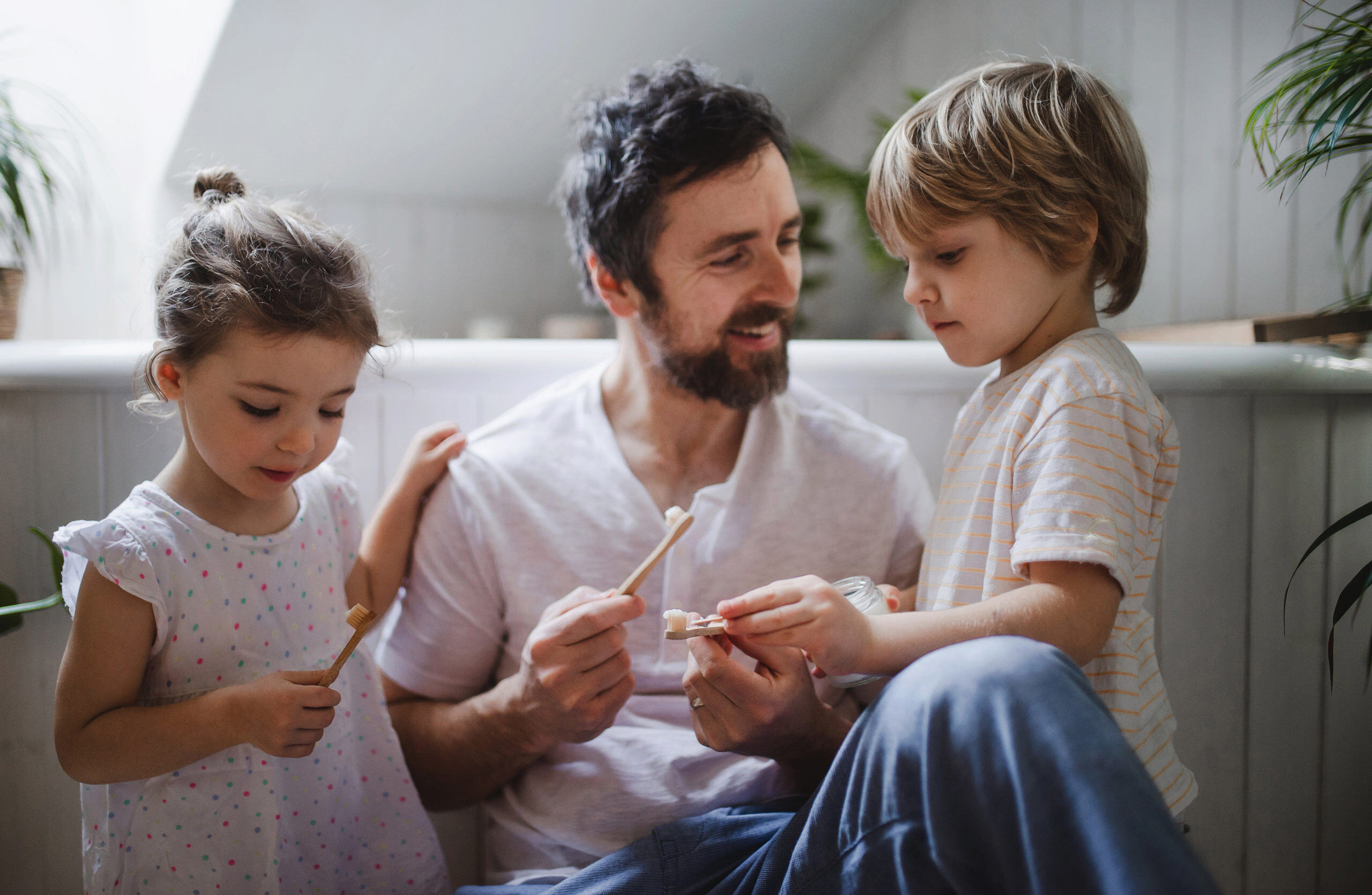 bigstock-Father-With-Two-Small-Children-436548713-scaled