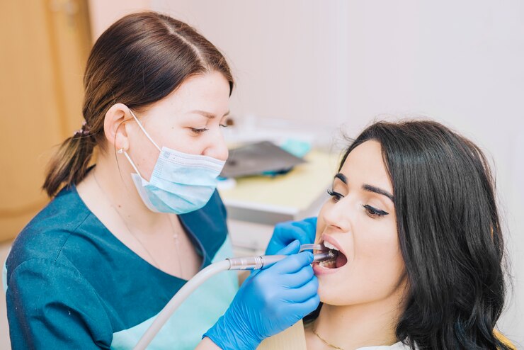 dentist-curing-teeth-patient-clinic_23-2148085320 dentist-curing-teeth-patient-clinic_23-2148085320