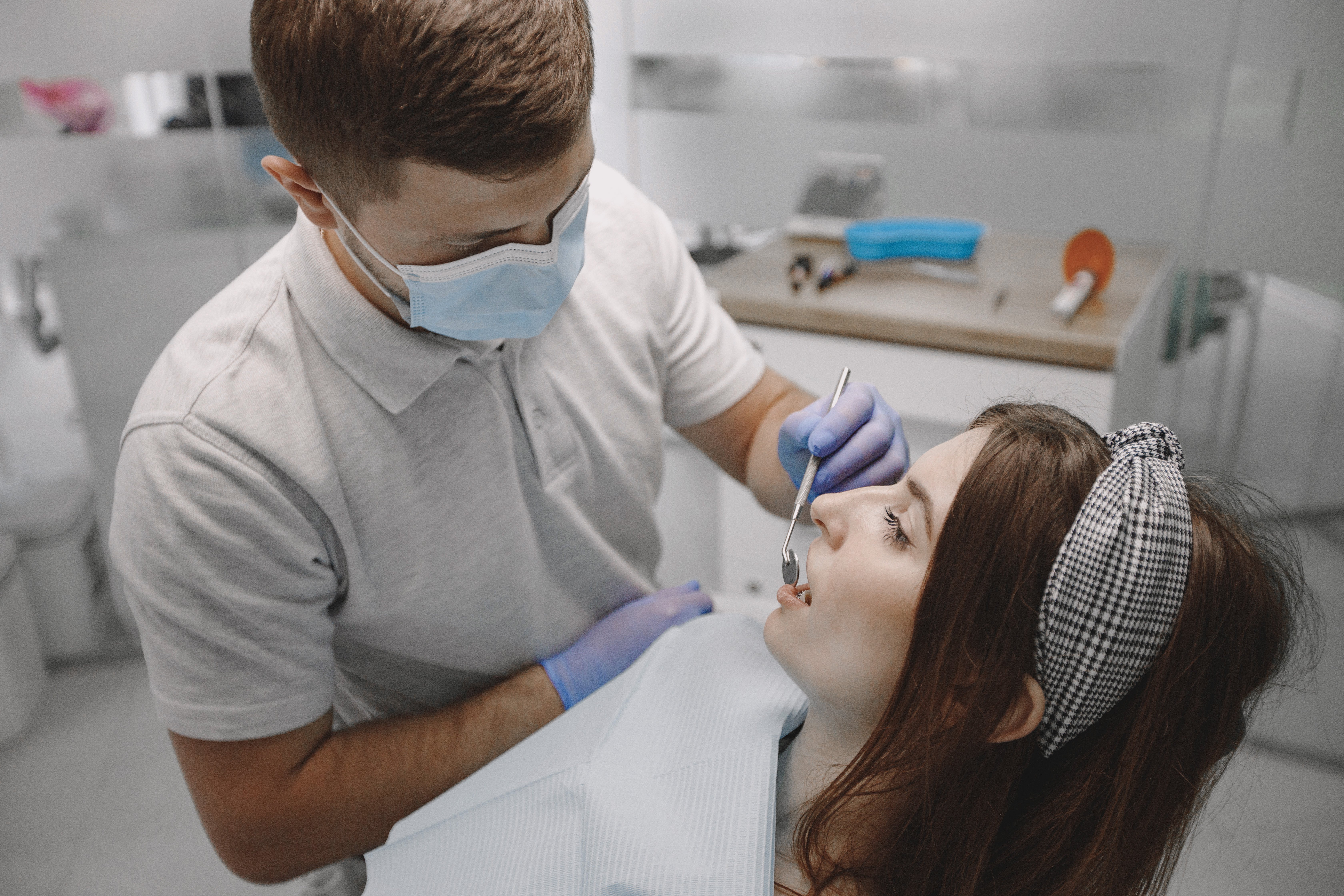 female-patient-with-braces-has-dental-examination-dentist-office-woman-wearing-white-clothes (5)