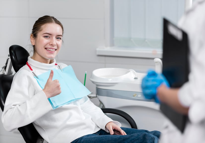 happy-young-female-dentist
