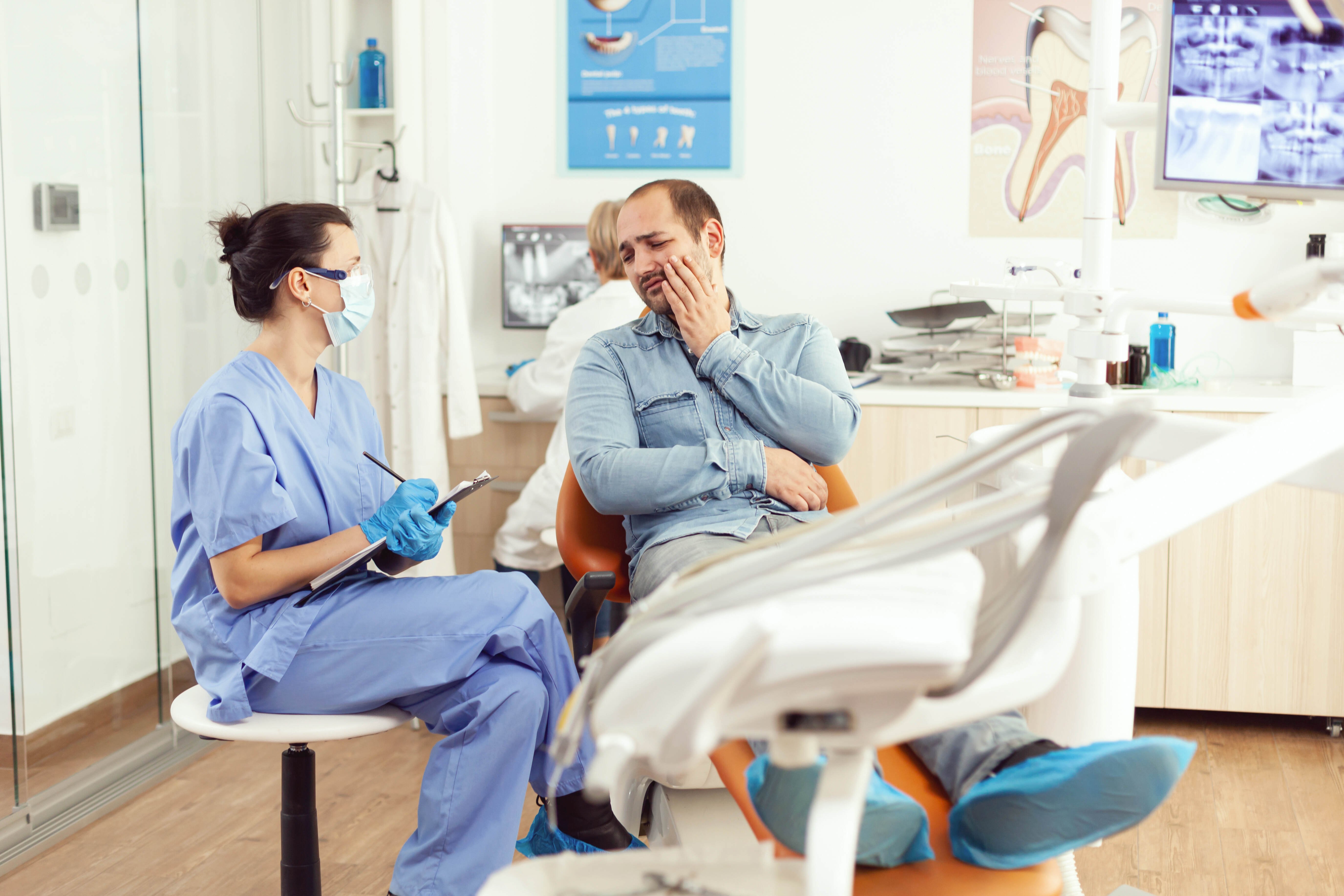 medical-nurse-examining-patient-