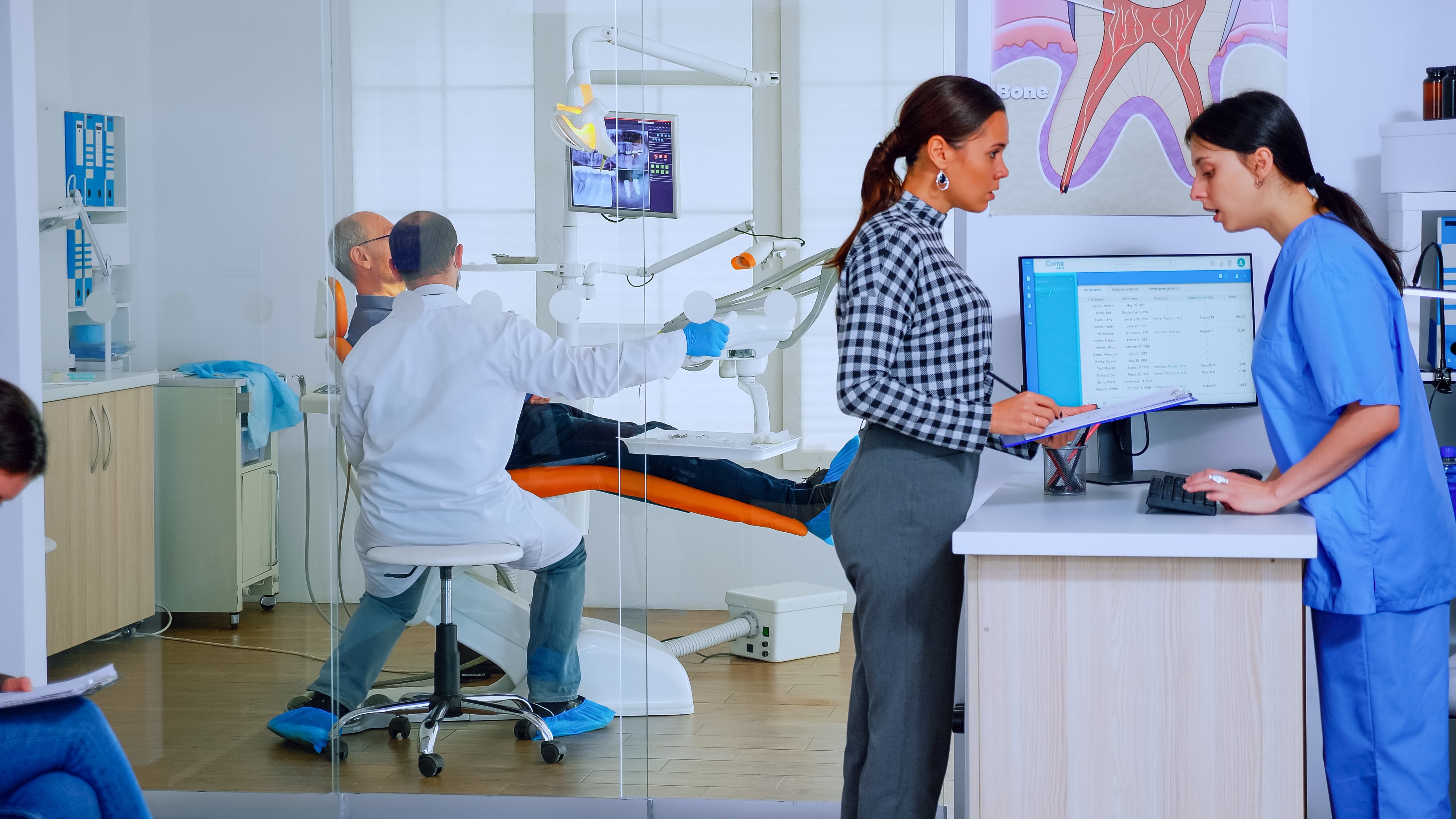 patients-asking-informations-filling-dental-document-preparing-teeth-exemination-senior-woman-sitting-chair-waiting-area-crowded-orthodontist-office-while-doctor-working-background