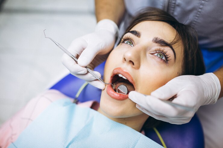 woman-patient-dentist_1303-9348