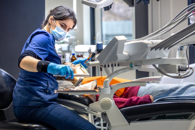 young-female-dentist-dental-office-dentist-work-dental-treatment-concept